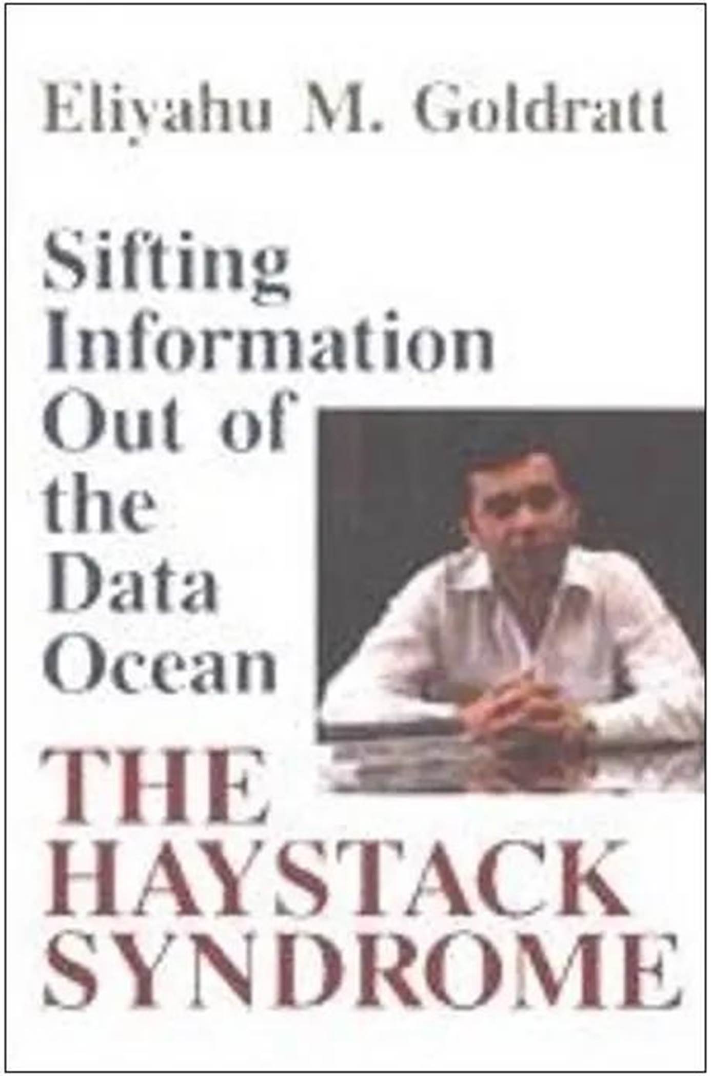 A person sitting at a desk

Description automatically generated